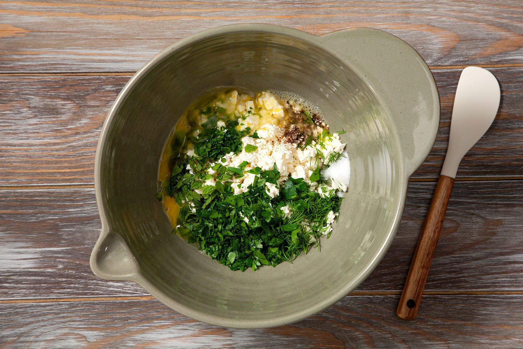 Mixing ingredients in large bowl