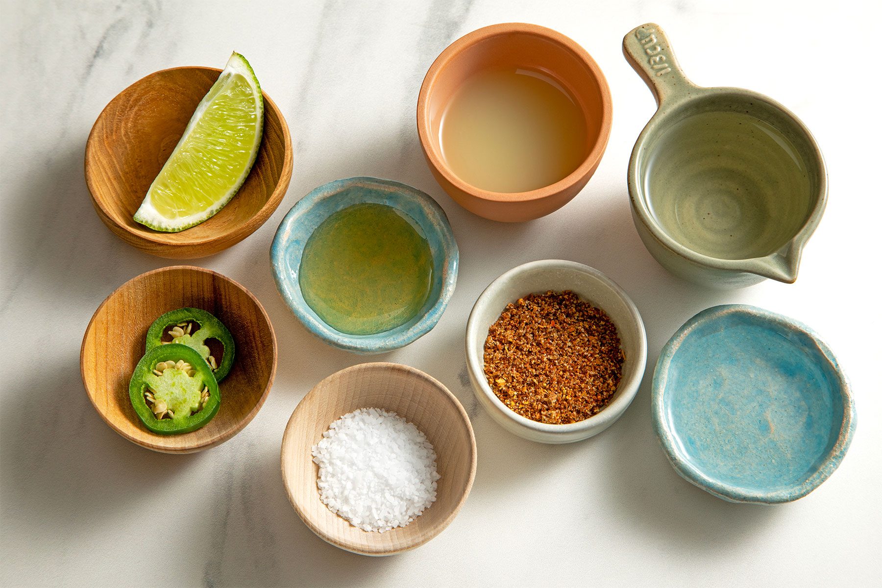 overhead shot of spicy margarita ingredients