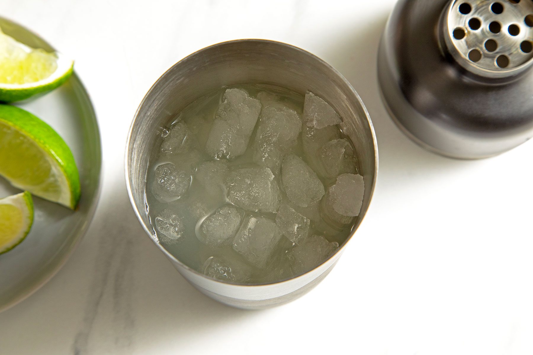 overhead shot of ice cubes in cocktail shaker