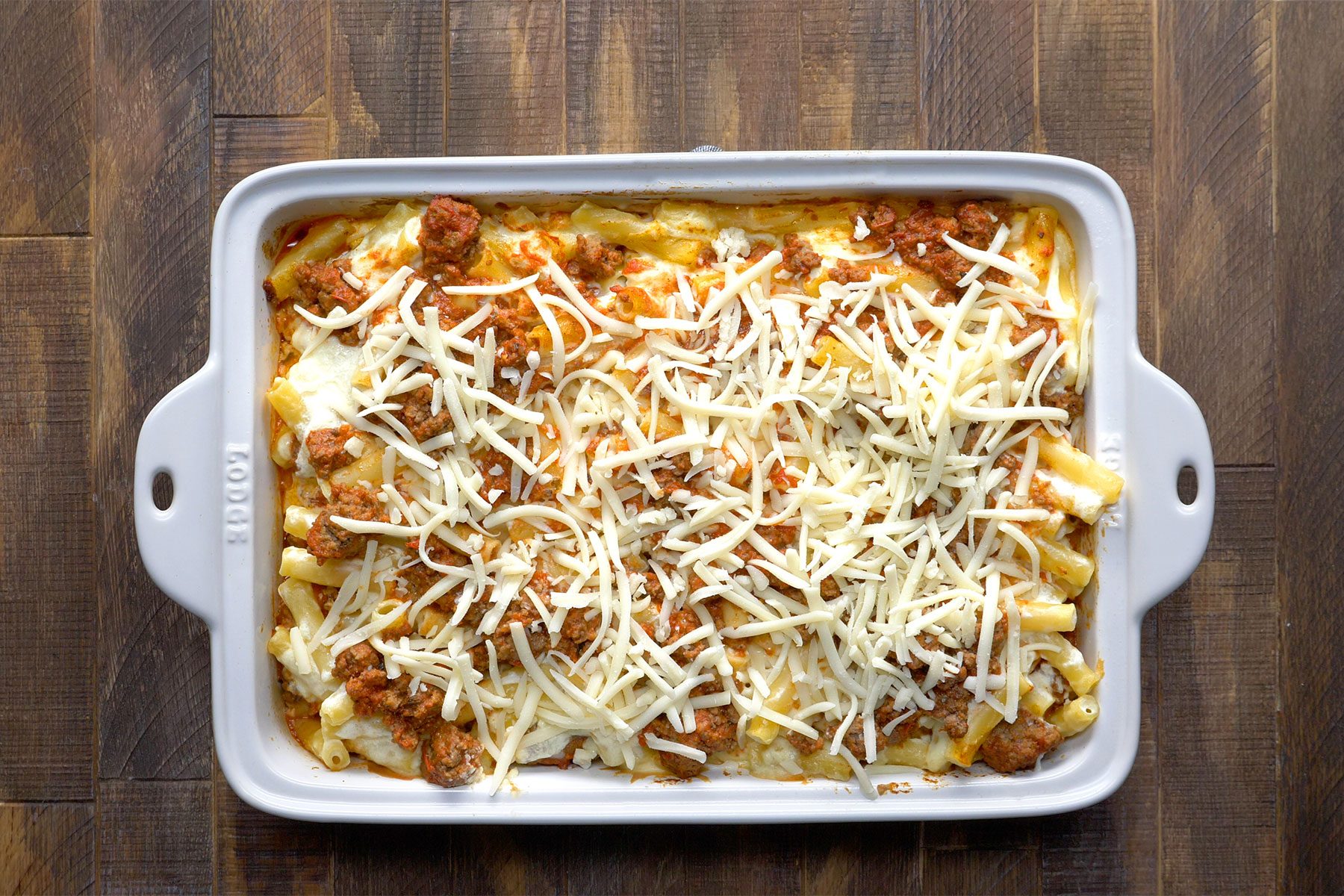 overhead shot of baked ziti in a baking dish