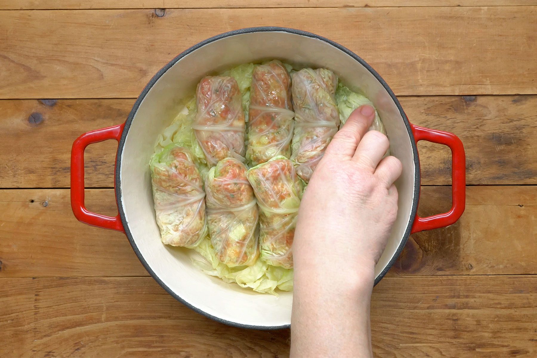 overhead shot of cabbage rolls in a dutch oven