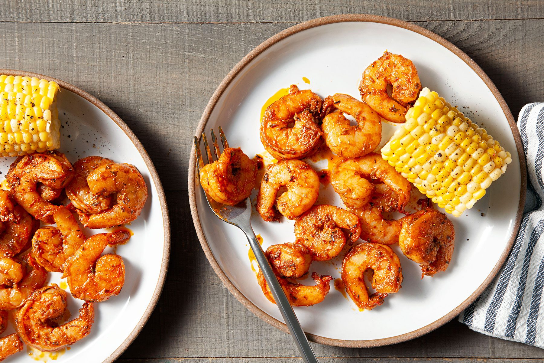 Cajun Shrimp served with corn on cob