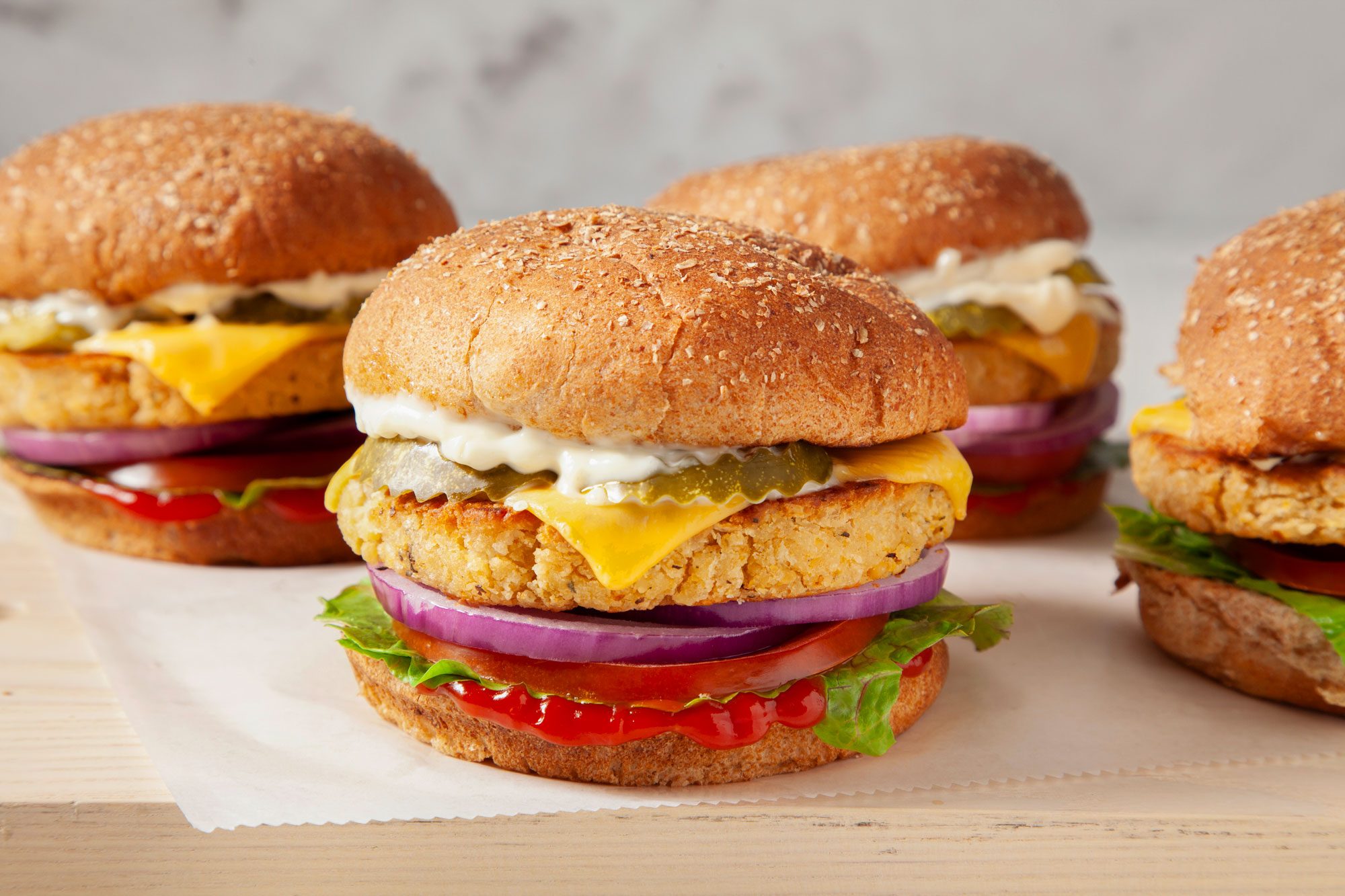 horizontal shot; Chickpea Burgers placed over wooden board;