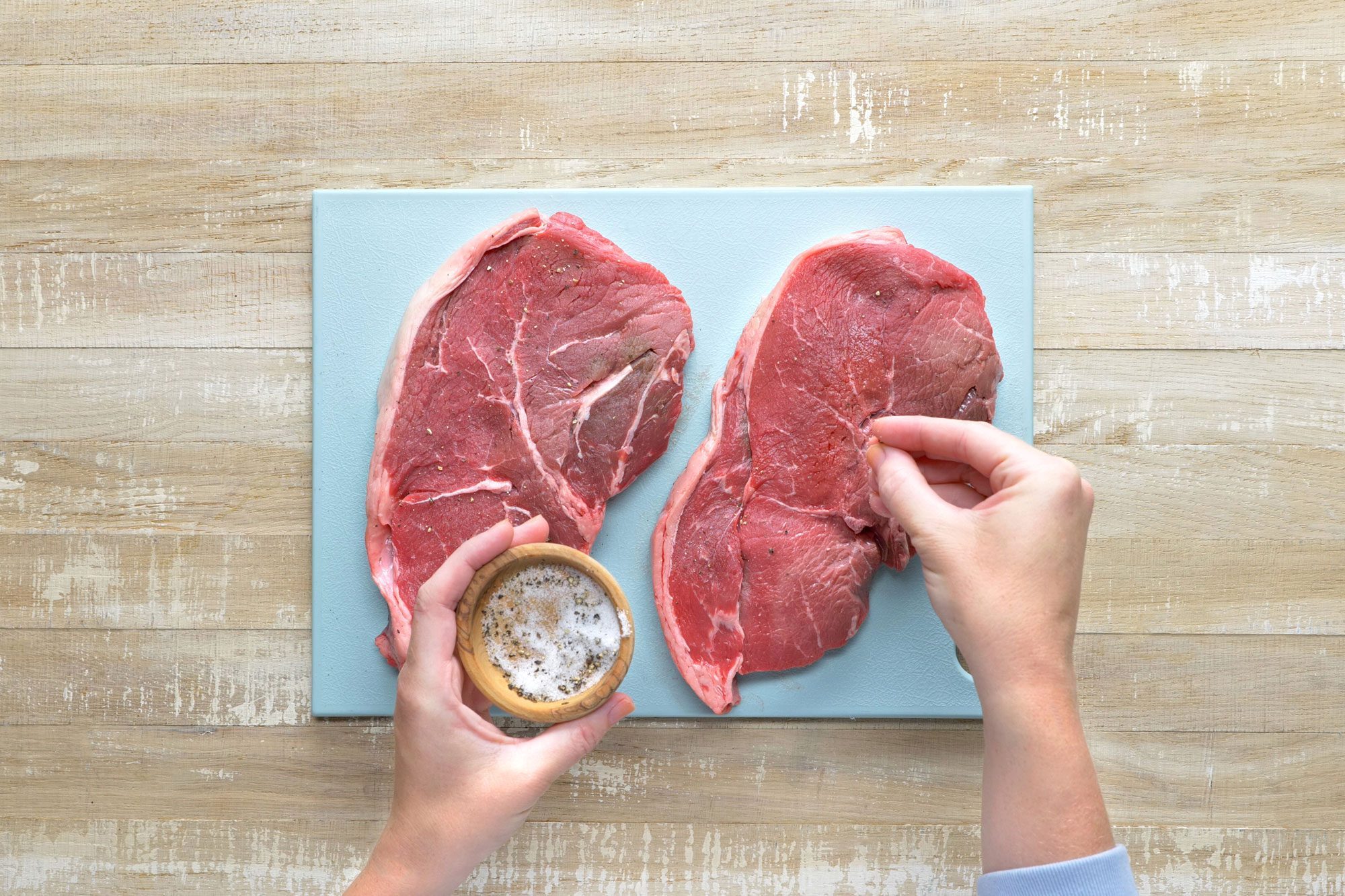 Sprinkle the steaks with the remaining salt and pepper