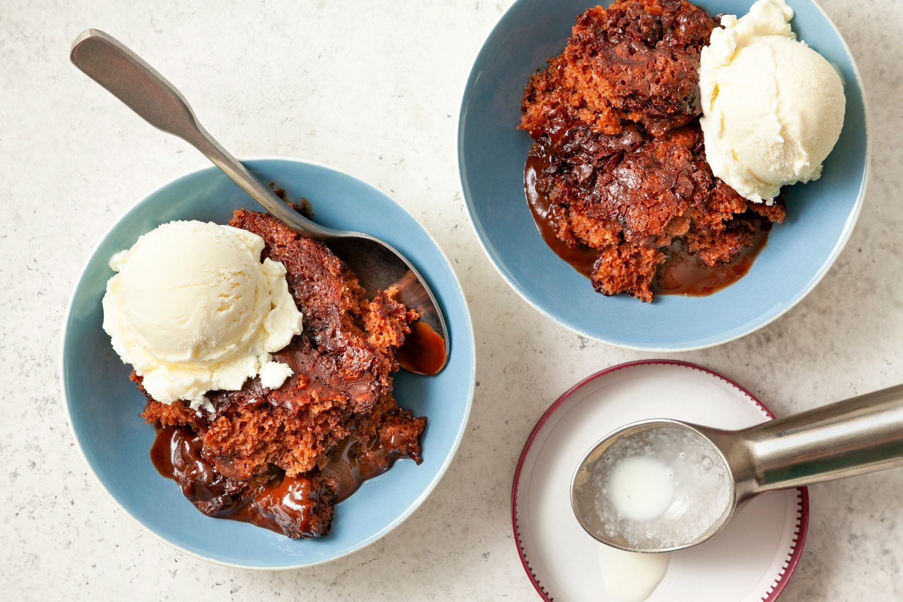 Two bowls of Chocolate Cobbler served with ice cream
