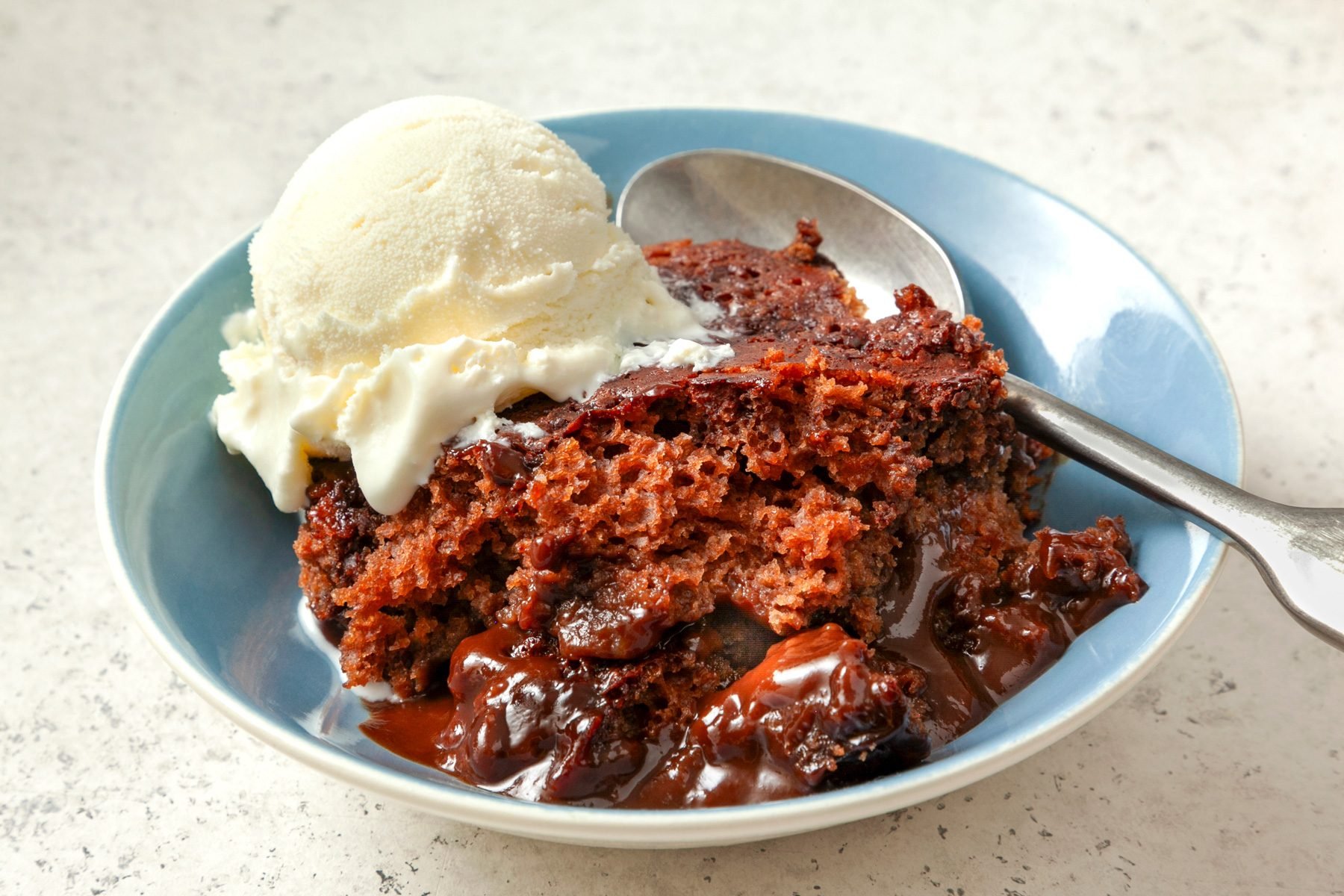 A bowl of Chocolate Cobbler served with ice cream