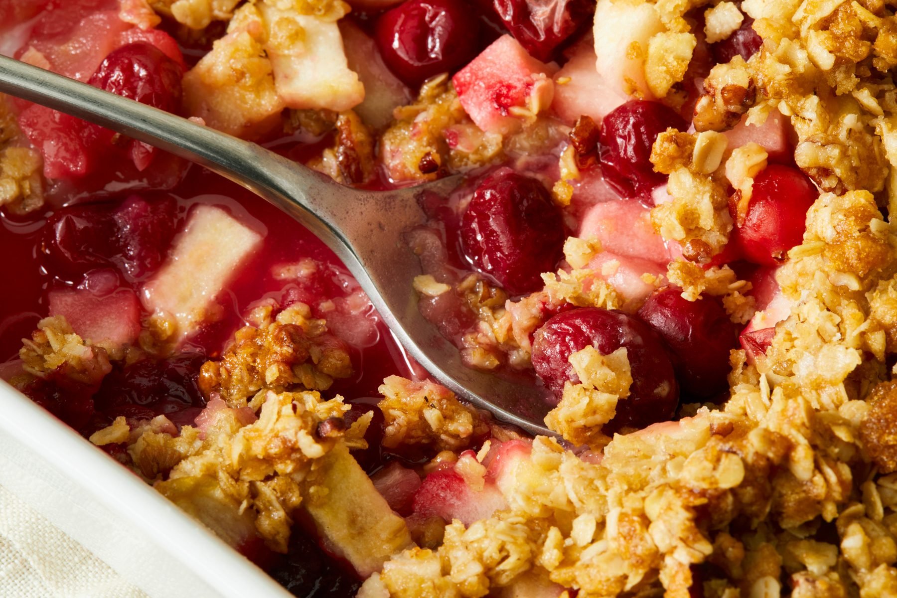 A delicious Cranberry Apple Crisp dessert with a golden crumb topping