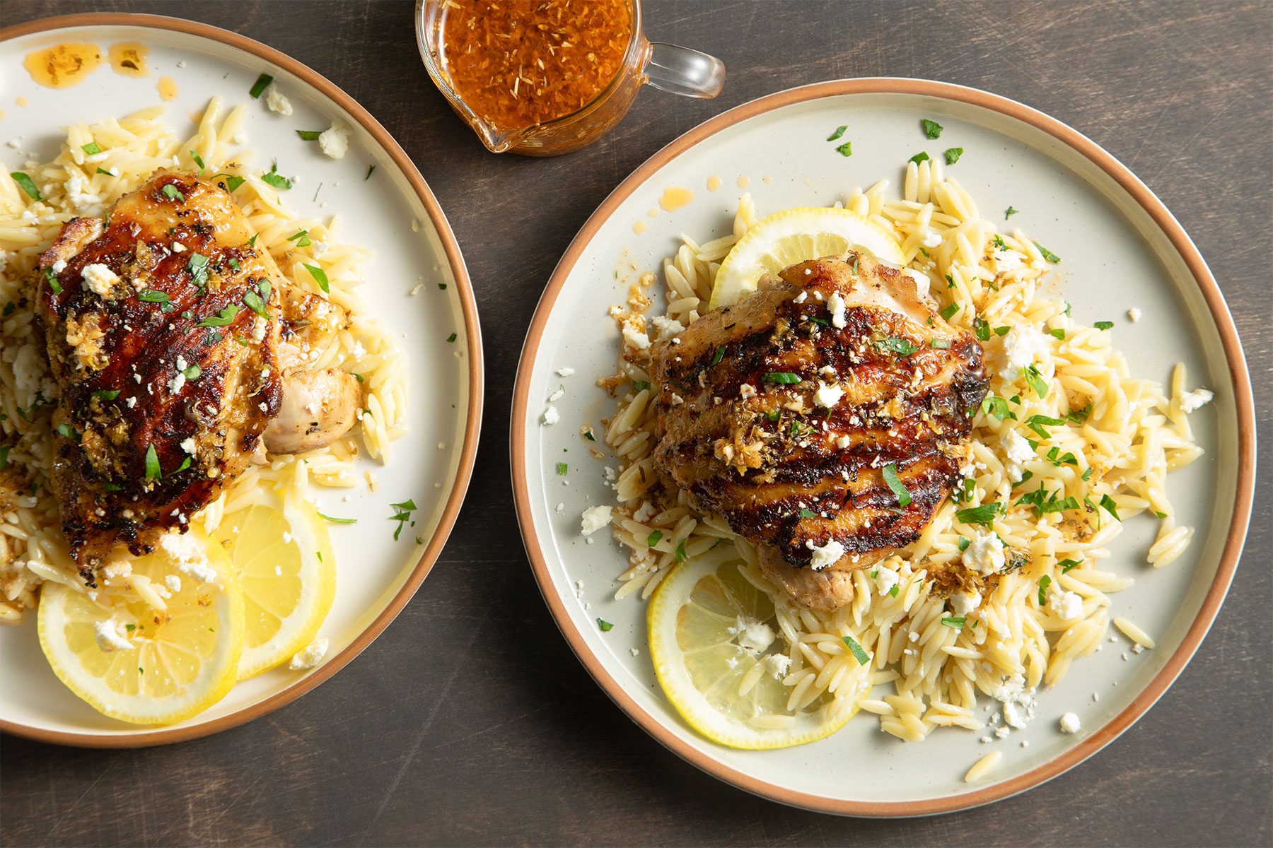 Greek Lemon Chicken served with rice and lemon slices