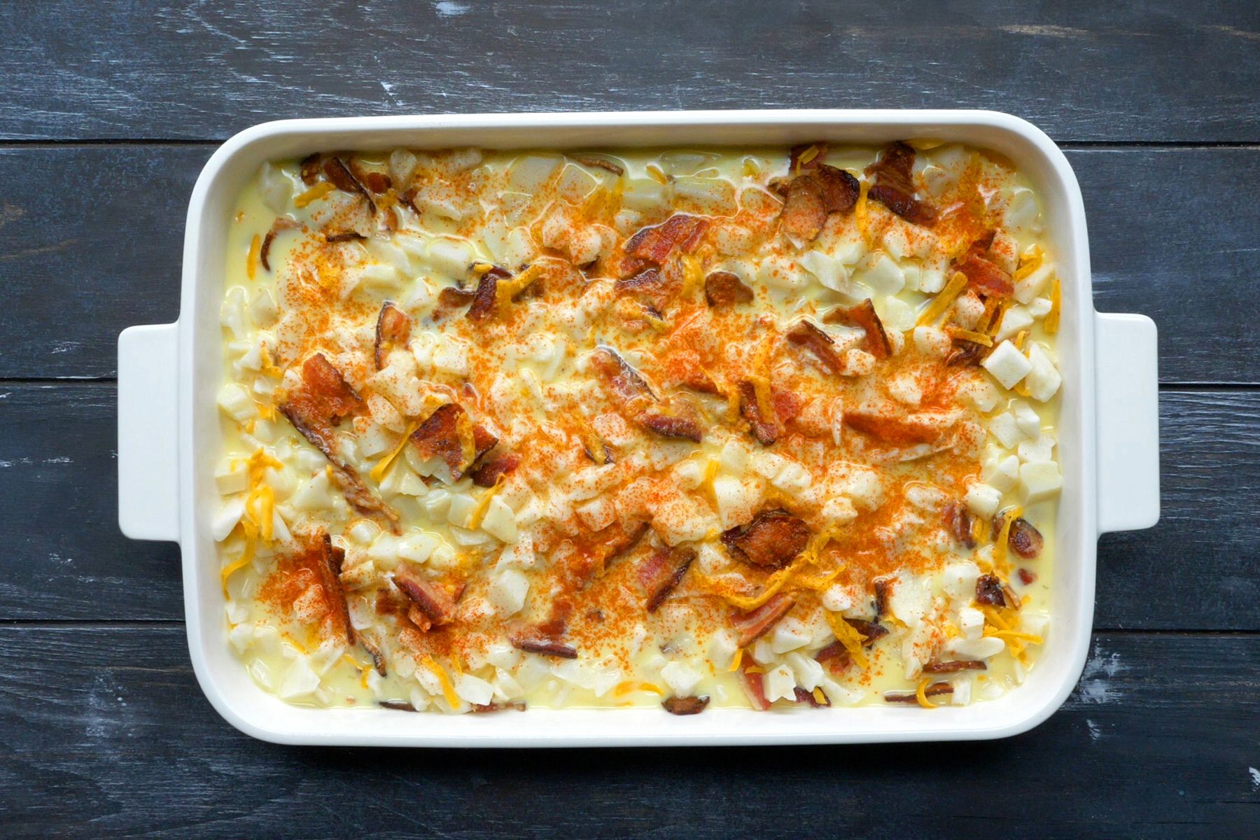 A white baking pan of Hash Brown Egg Bake