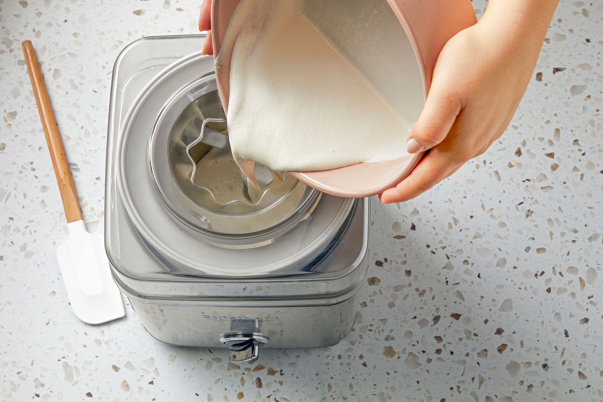 Fill the ice cream maker cylinder no more than two-thirds full