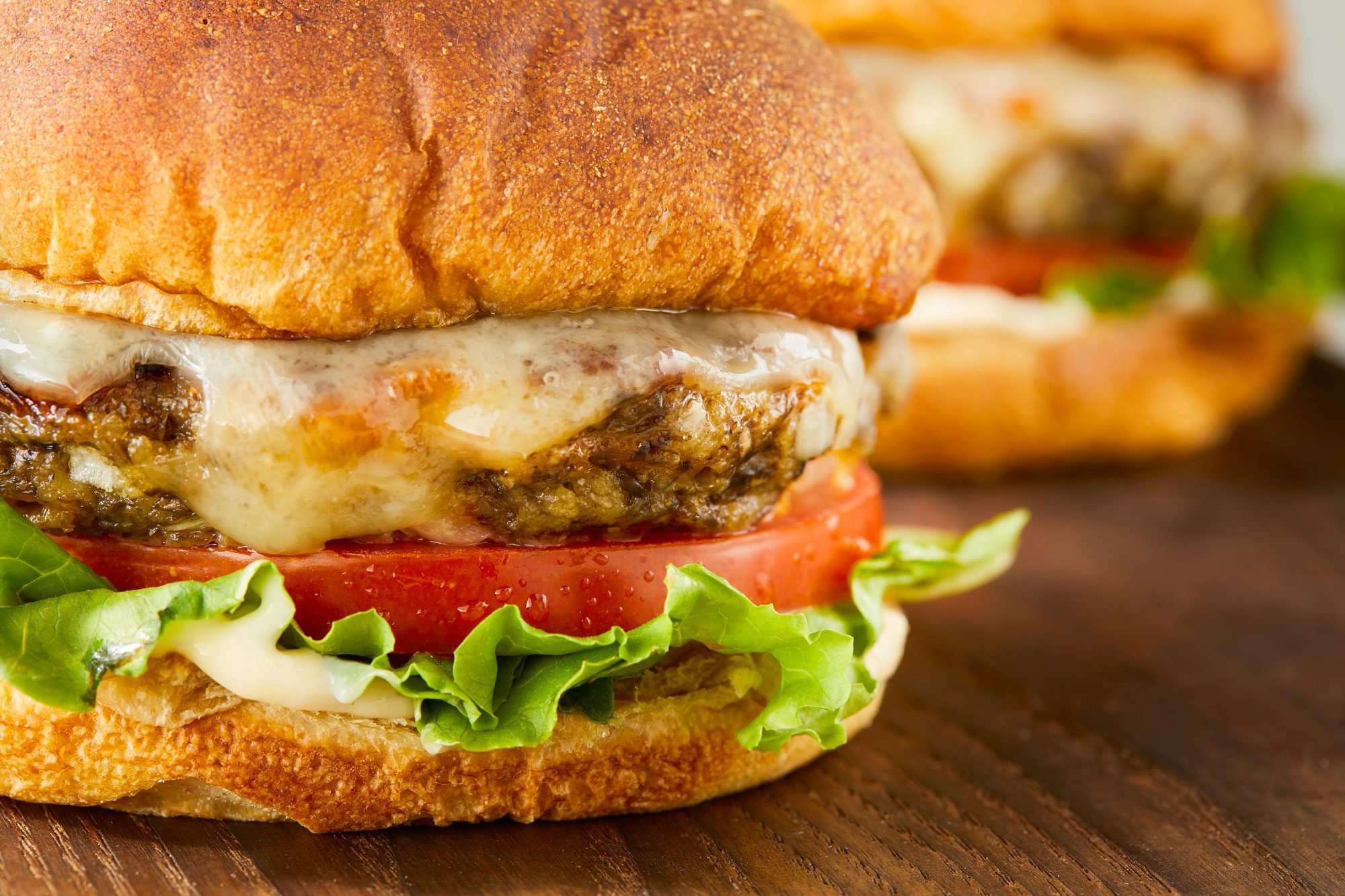 Horizontal shot; Mushroom Burger placed over wooden board;