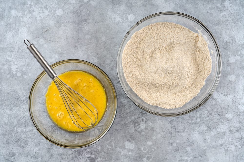 mixing wet ingredients and dry ingredients separately for Pineapple Zucchini Bread