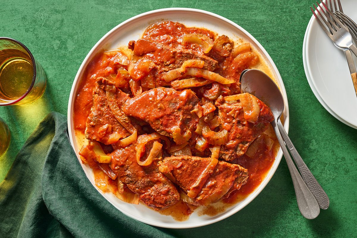 Overhead image of slow cooker Swiss steak on a plate