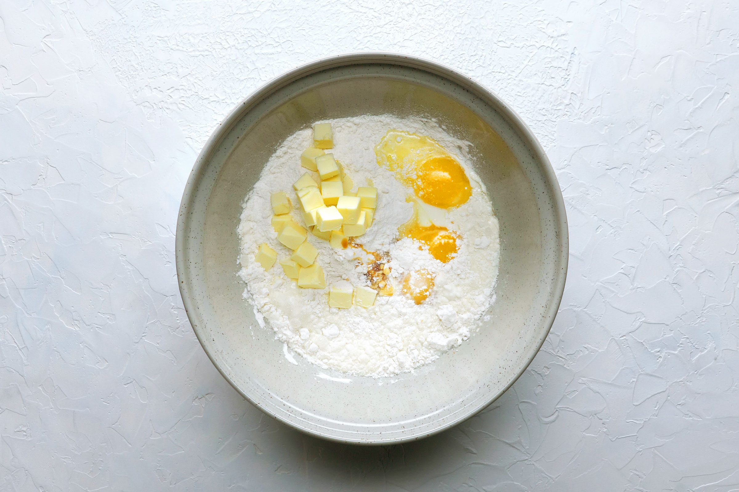 tres leches cake batter in a bowl