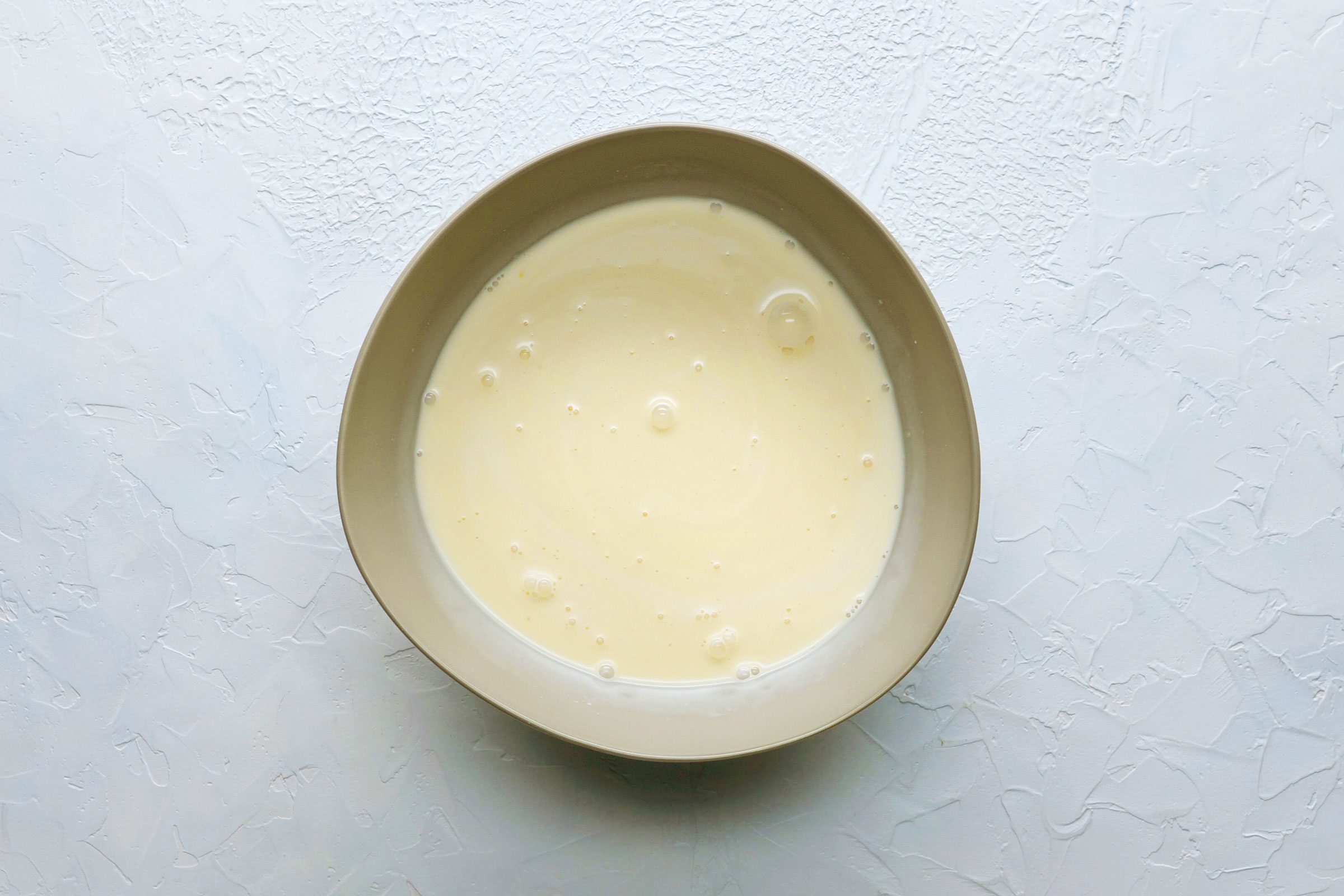 Milk mixture for tres leches cake In a bowl