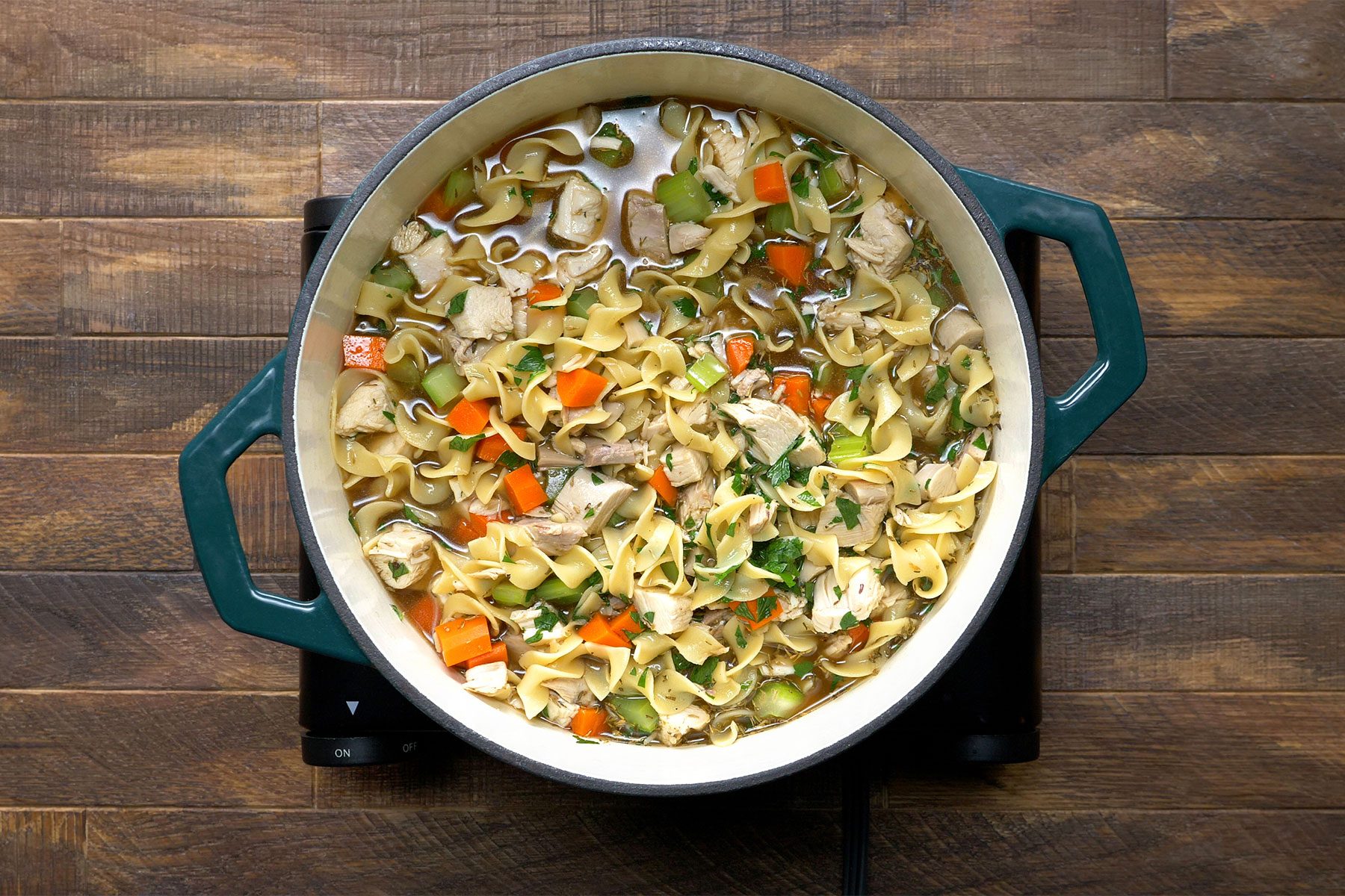 overhead shot of cooked noodles and veggies