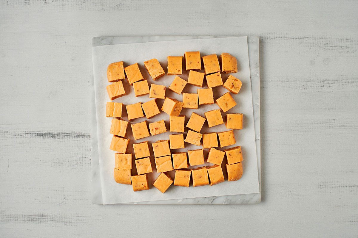 Cut fudge into squares