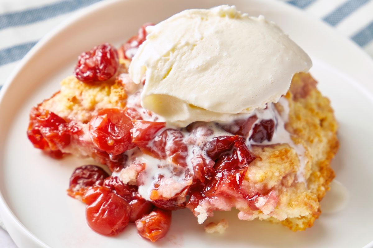 Cherry Cobbler close up on a plate with ice cream