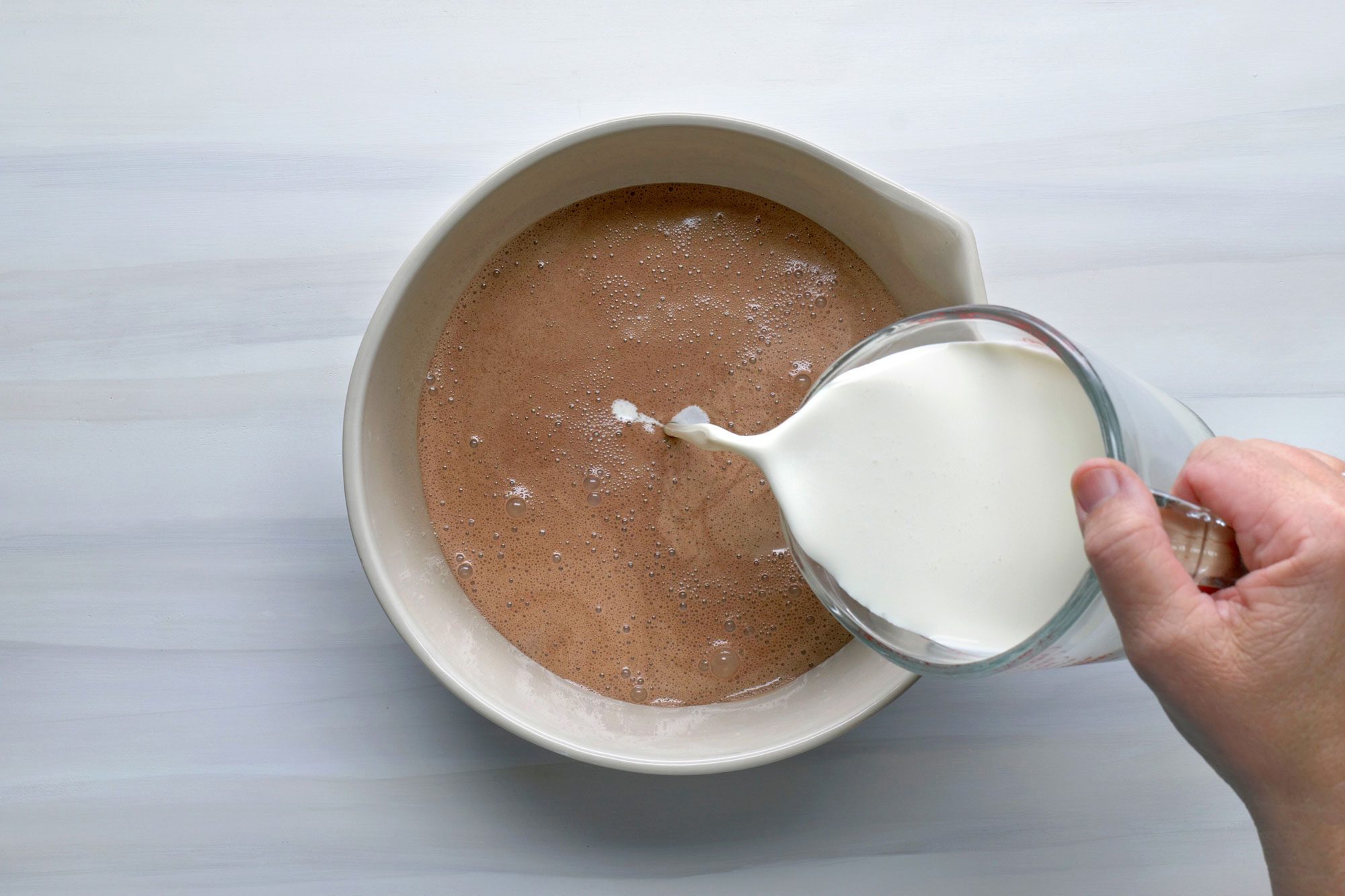 Transfer smooth mixture into a large bowl and stir in with heavy cream