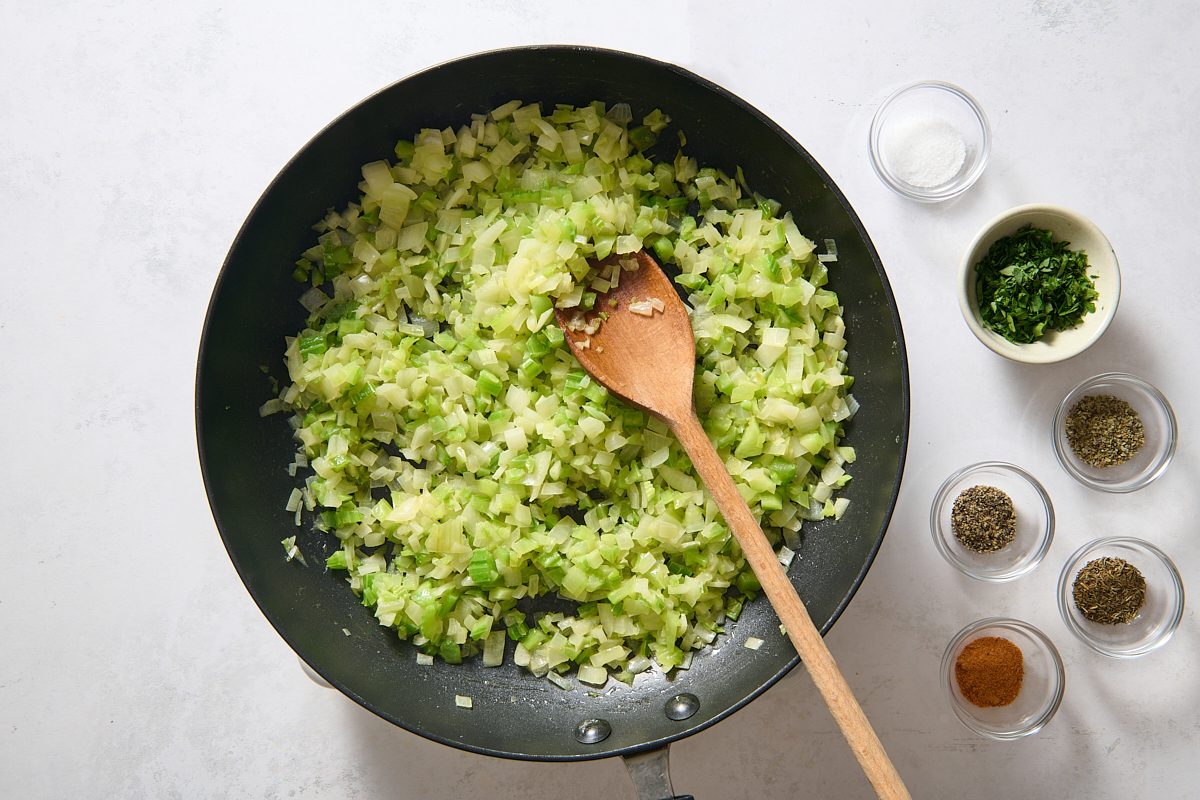 Sautéing the vegetables in a skillet