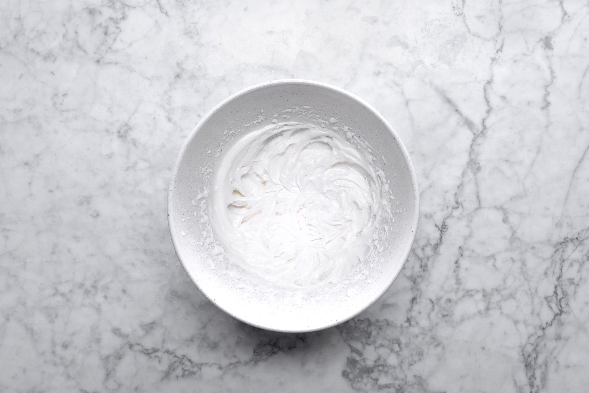 Beat together the confectioners’ sugar in a large bowl