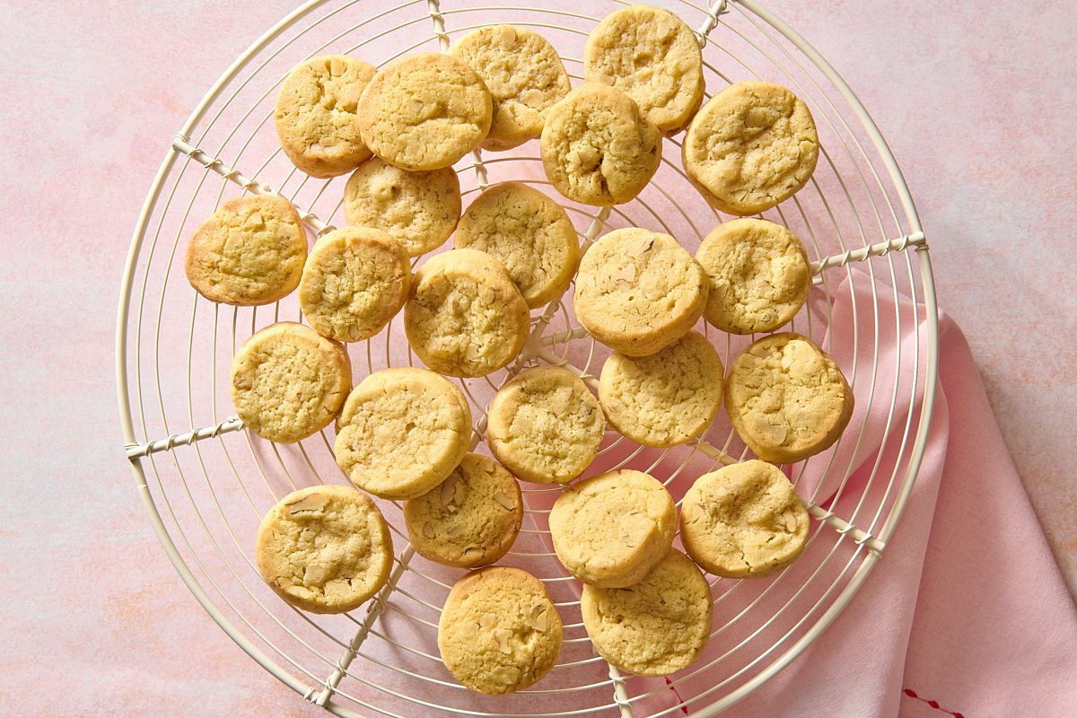 Overhead image of icebox cookies on a round wire rack