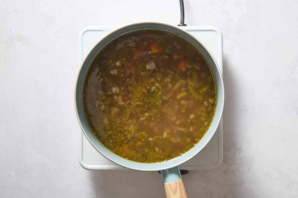 Lentils simmering in the saucepan