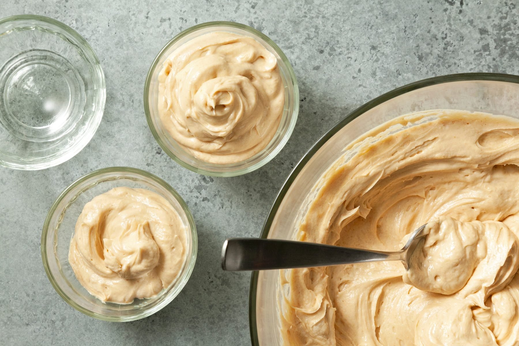 Spoon or pipe the peanut butter mousse into ramekins