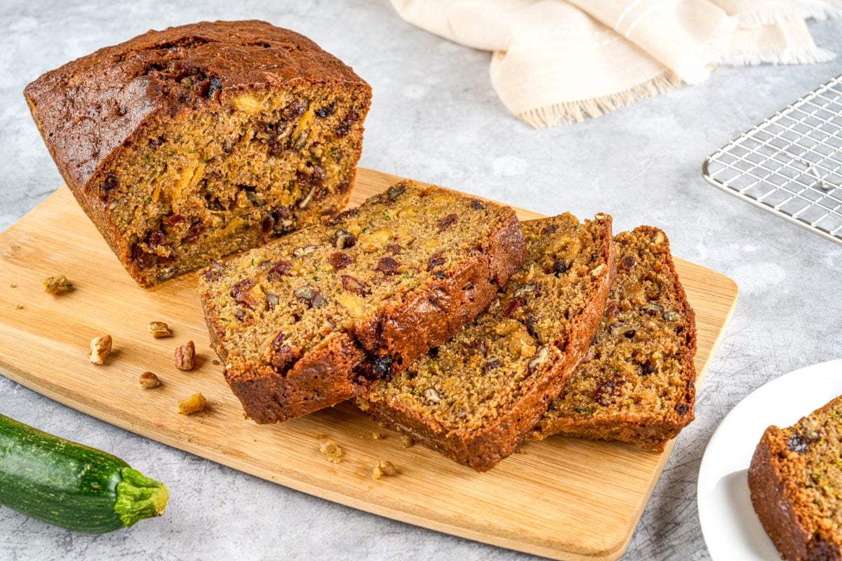 Pineapple Zucchini Bread sliced on a cutting board