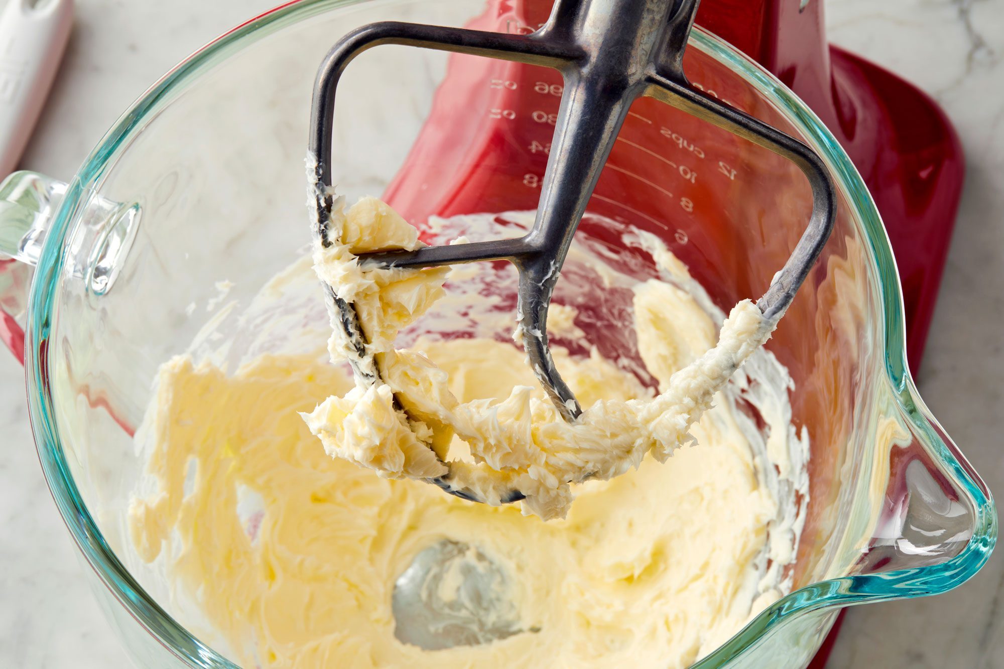 In another bowl, whisk flour, baking soda, cream of tartar, nutmeg and salt; gradually beat into creamed mixture.