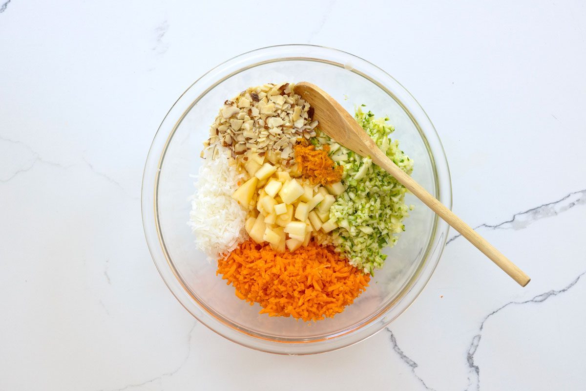 Zucchini, Carrot, Apple, Almonds, and Coconut In A Bowl