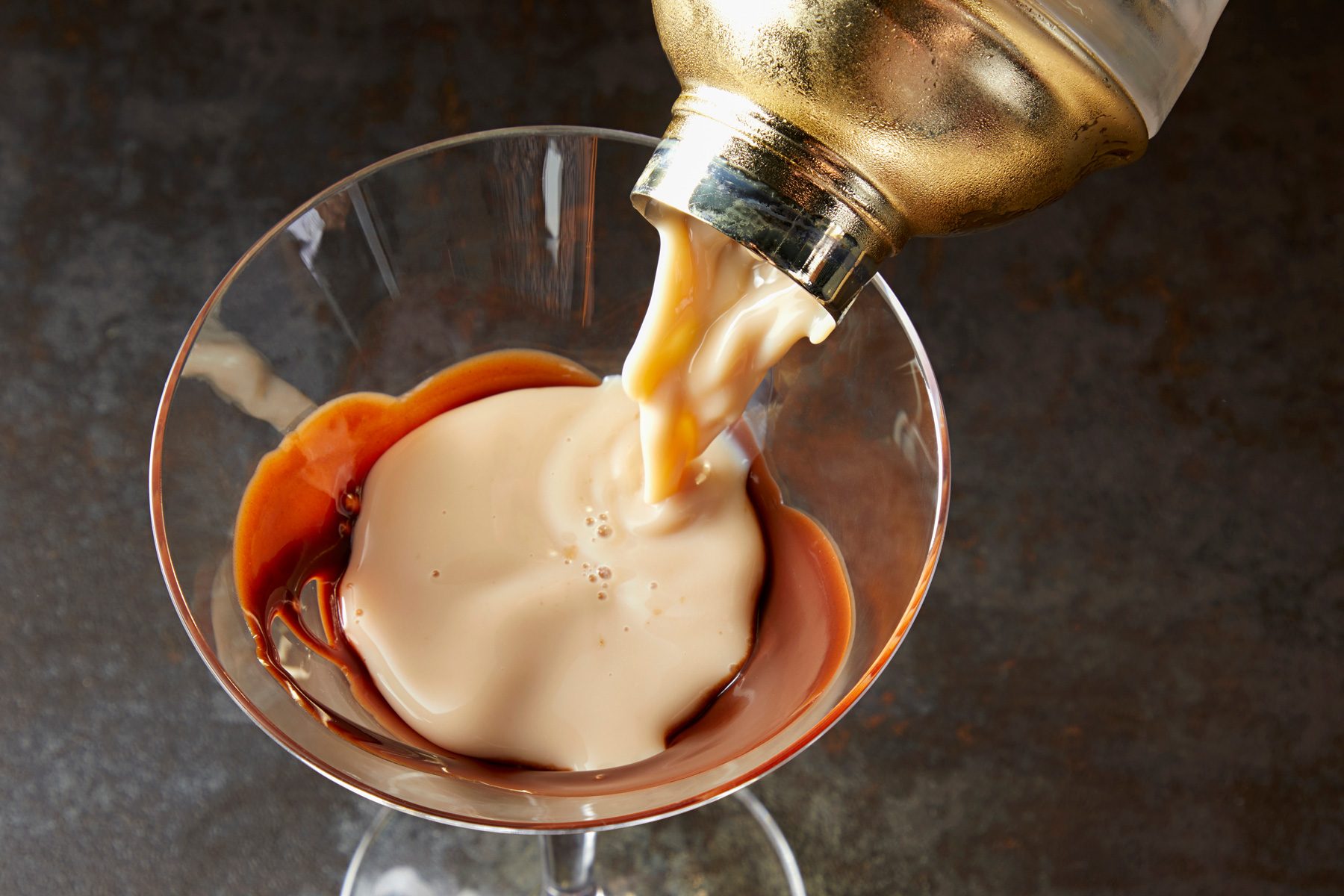 Straining Chocolate Martini into a martini glass