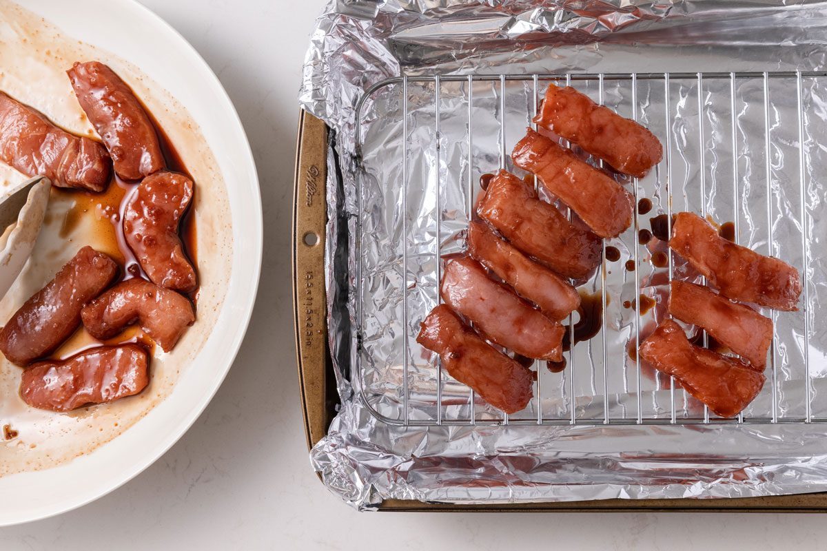 Pork being arranged in baking tray. Chinese Boneless Spare Ribs photographed for Taste of Home