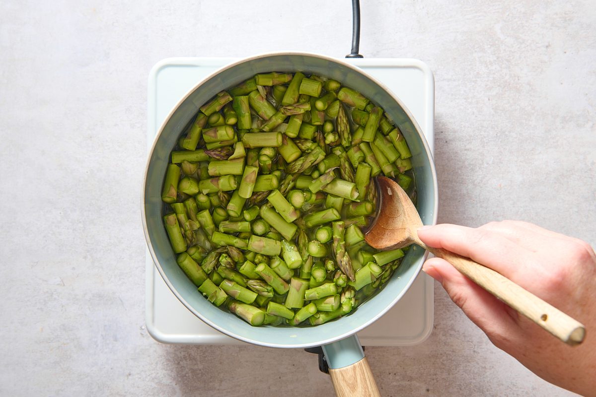 Cooking the vegetables in a saucepan