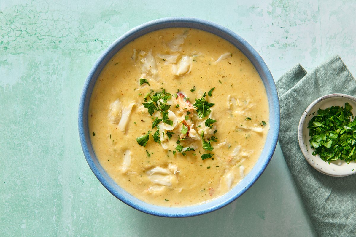 Overhead shot of cream of crab soup in a bowl