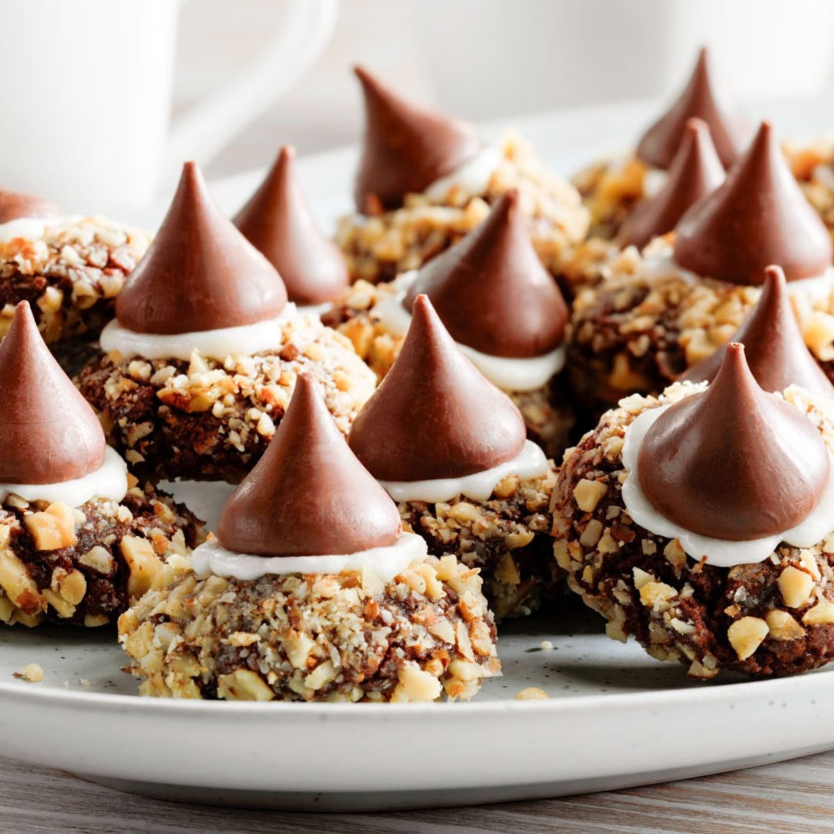 Chocolate Thumbprint Cookies on a white serving plate