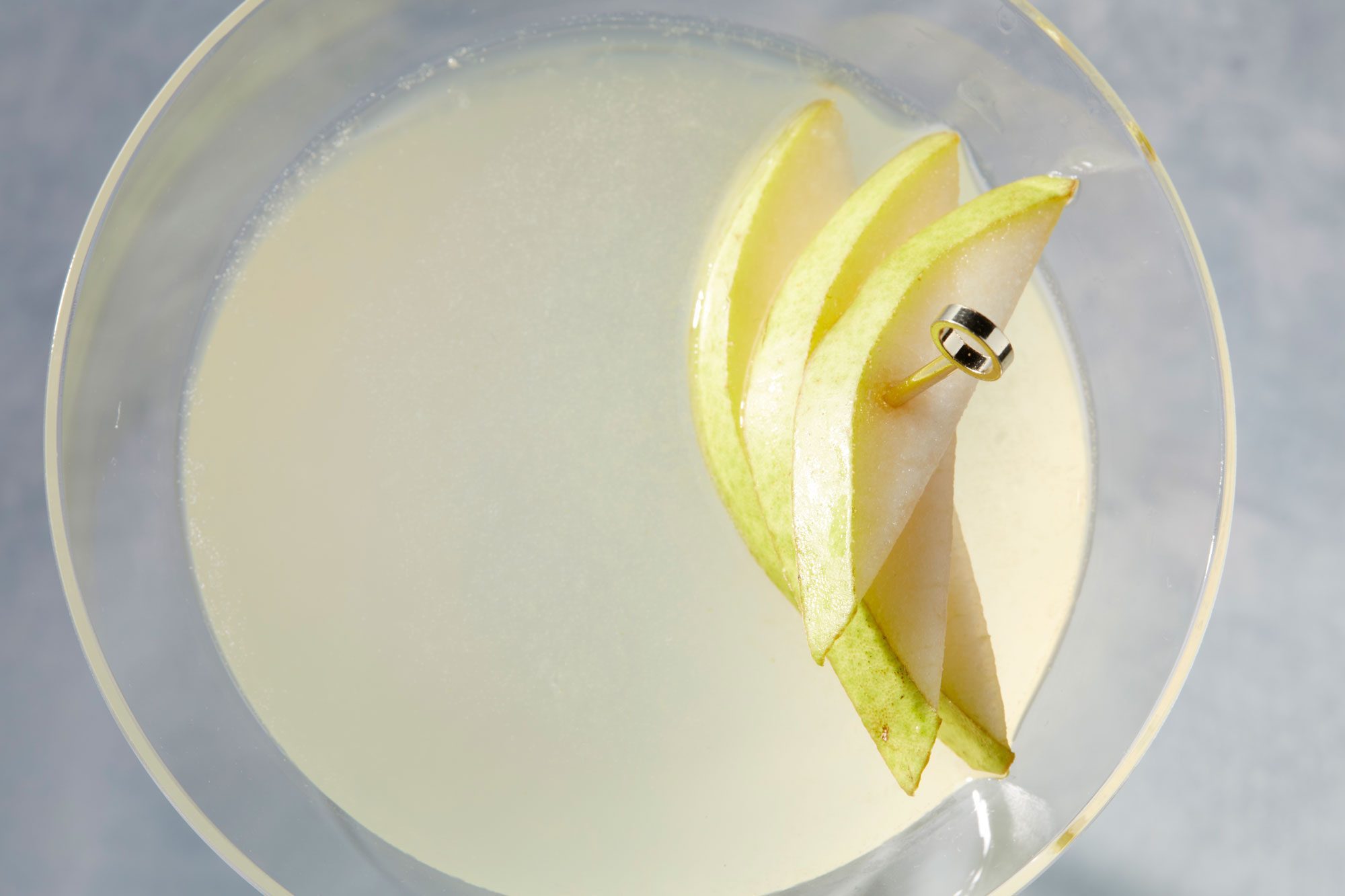 Pear martini garnished with pear slices