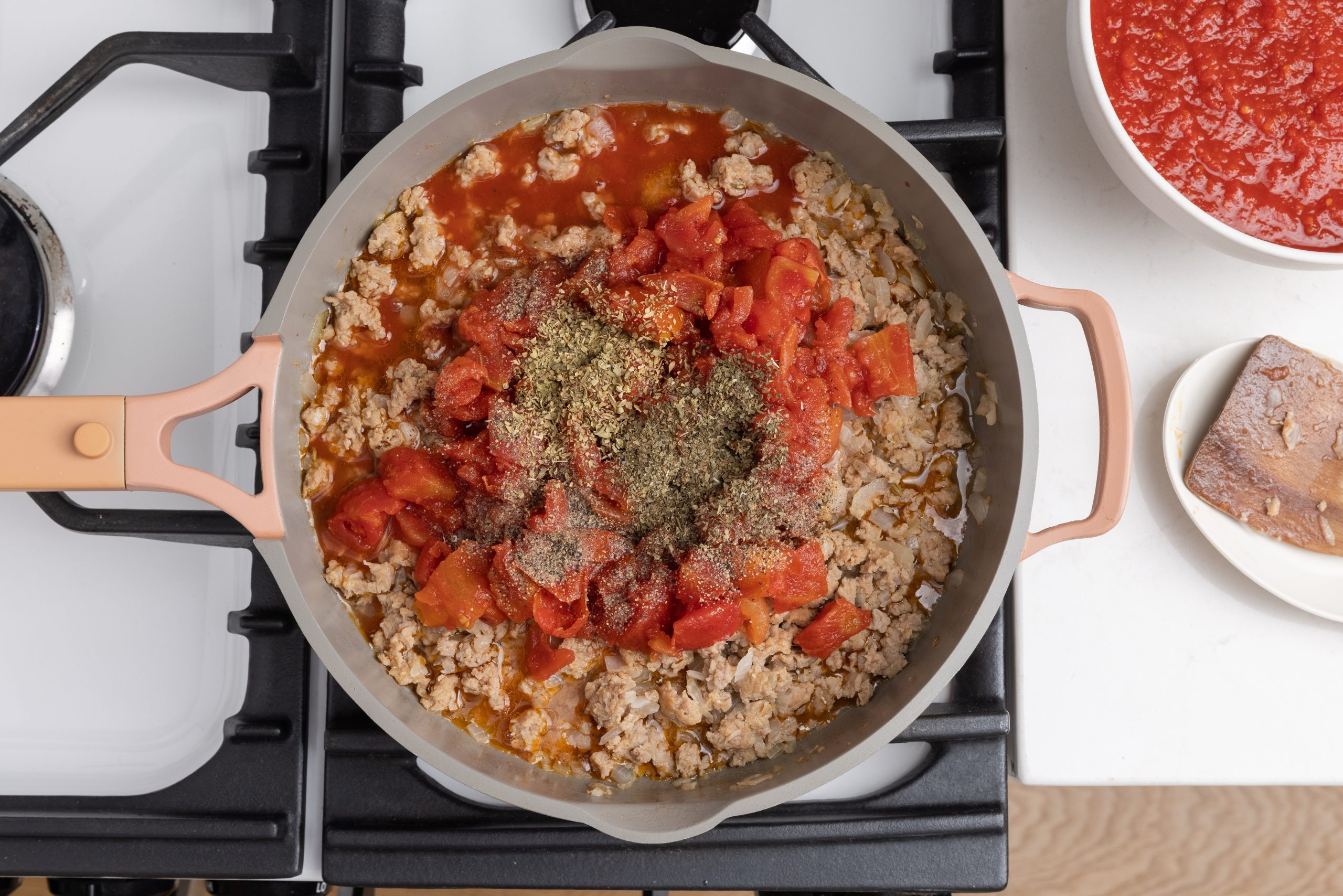 Pasta sauce being cooked in skillet. 