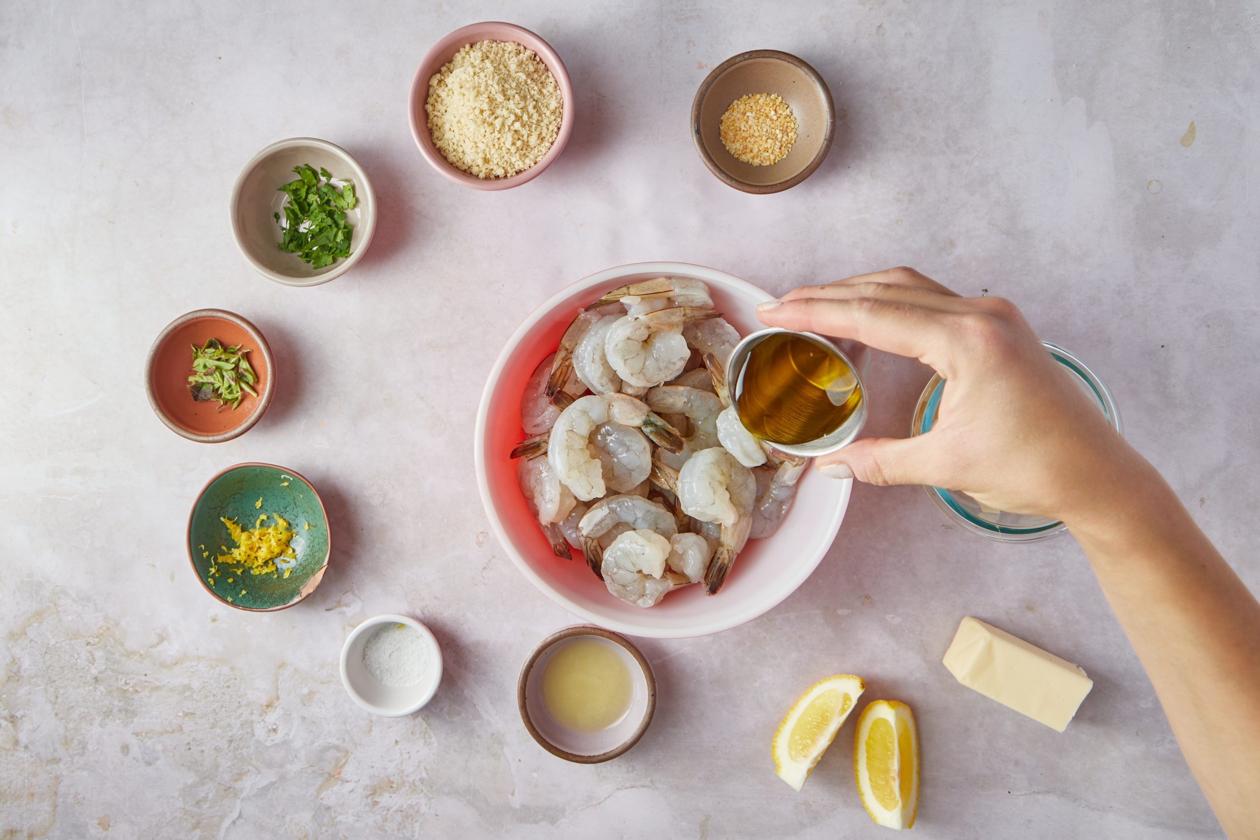 This Italian-style dish will give you that restaurant environment for those nights when you want something a little fancy. Shrimp is flavored with a light sauce made of garlic, lemon, oregano and white wine and then covered in a crust of panko bread crumbs mixed with Parmesan cheese.