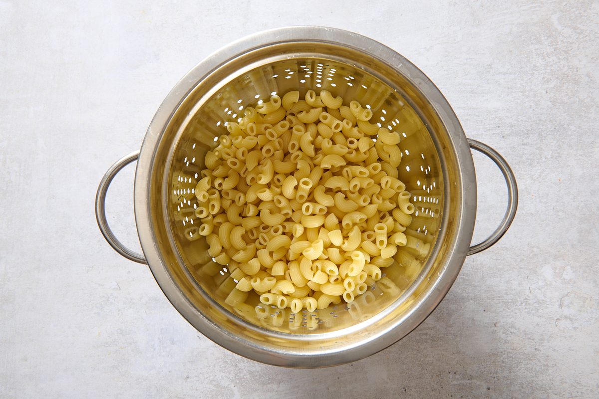 Pasta draining in a colander