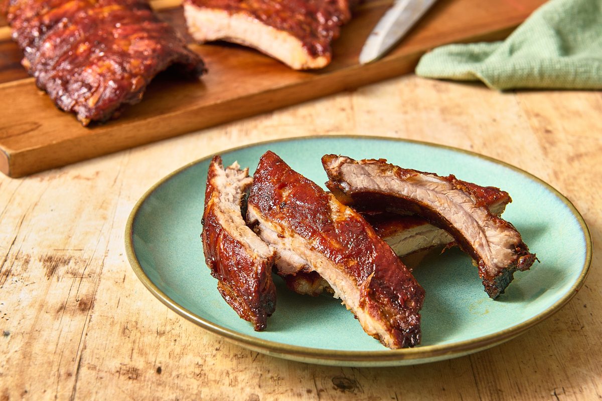 A portion of smoked ribs on a plate