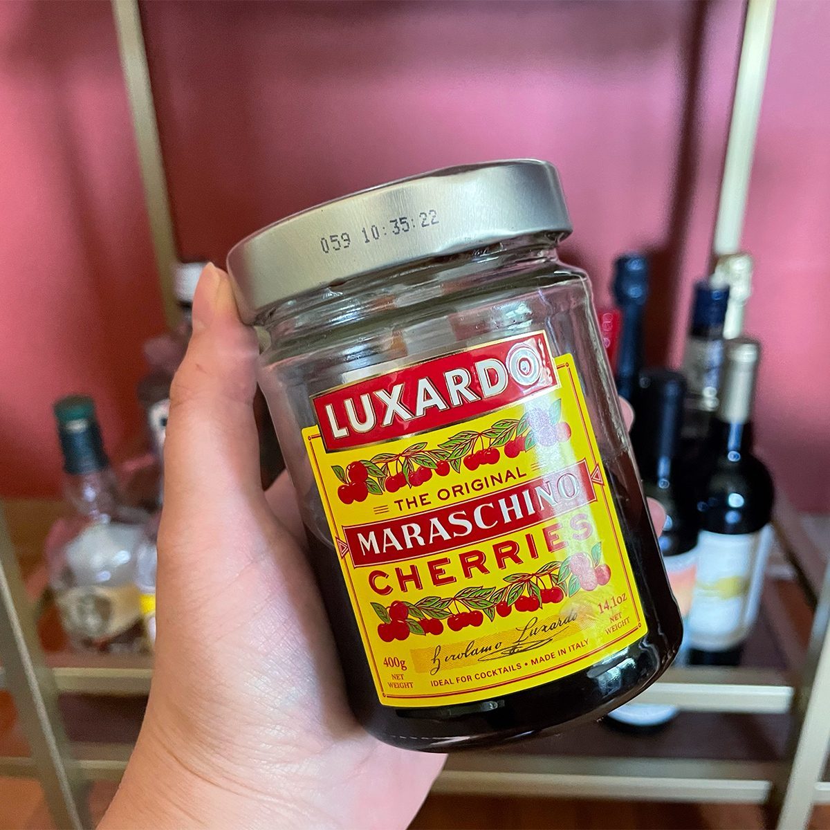 Holding Jar of Luxardo Cherries