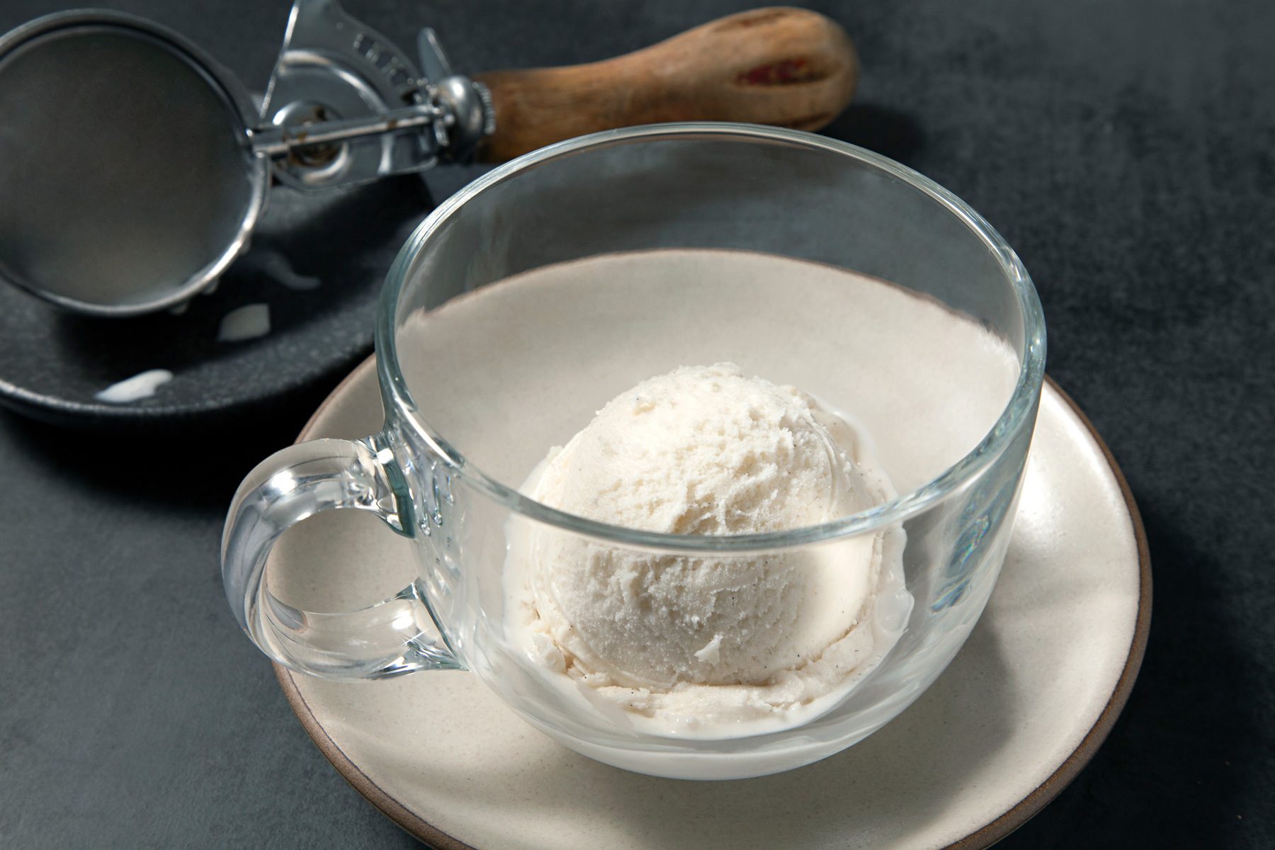 Scoop of Gelato in a glass cup on plate