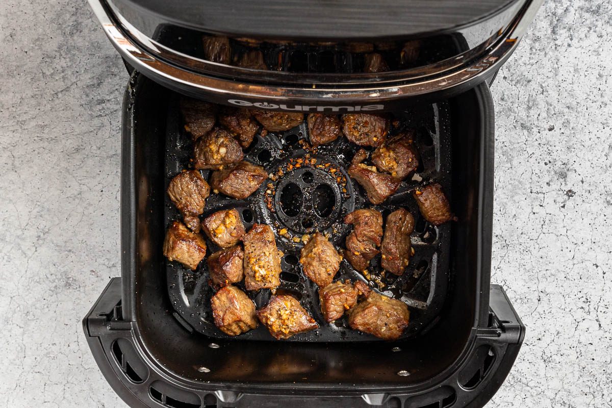 Taste of Home Air Fryer Steak Bites recipe photo of the steak cooked in the air fryer again to brown the garlic.