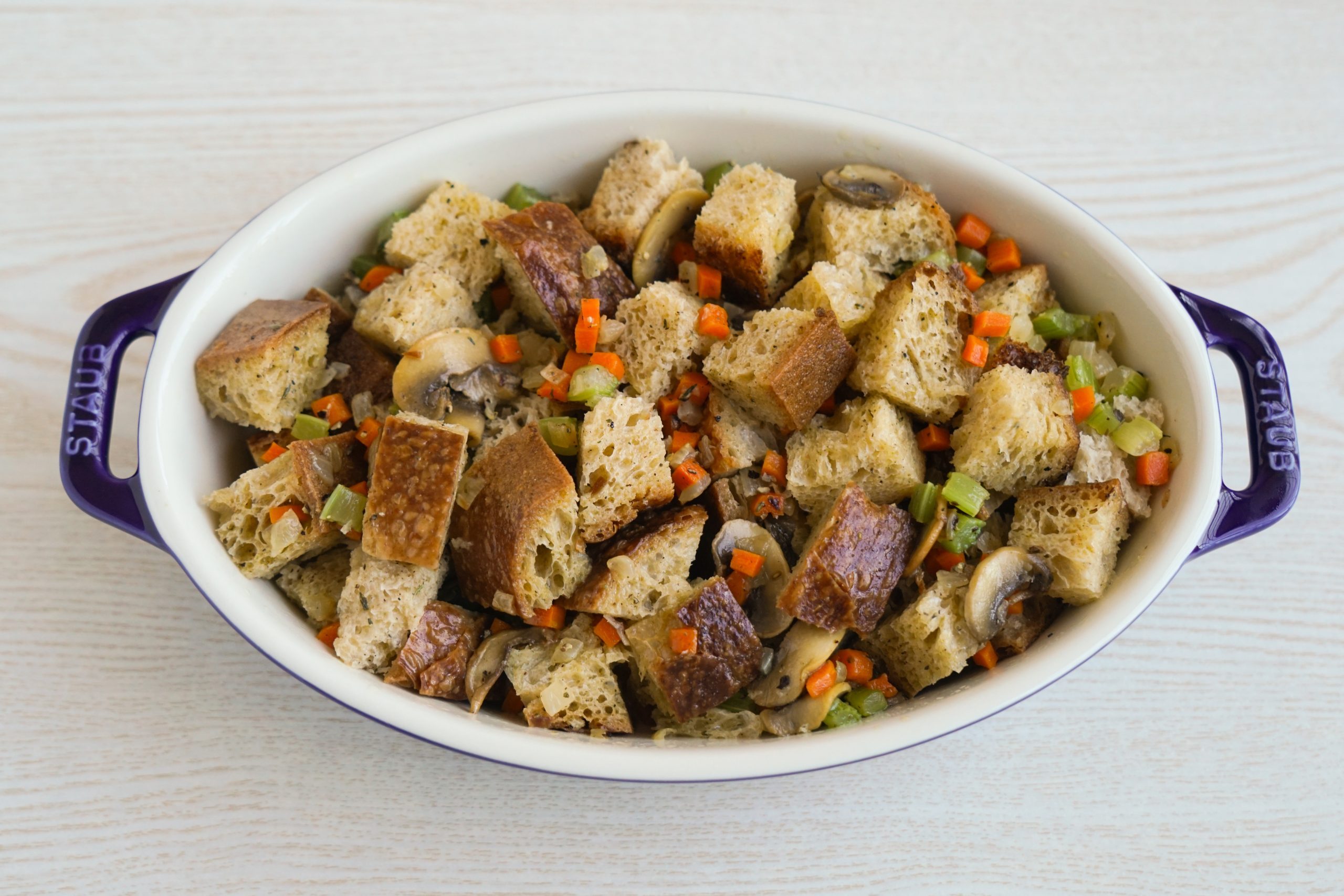 Stuffing in a casserole dish, ready to bake