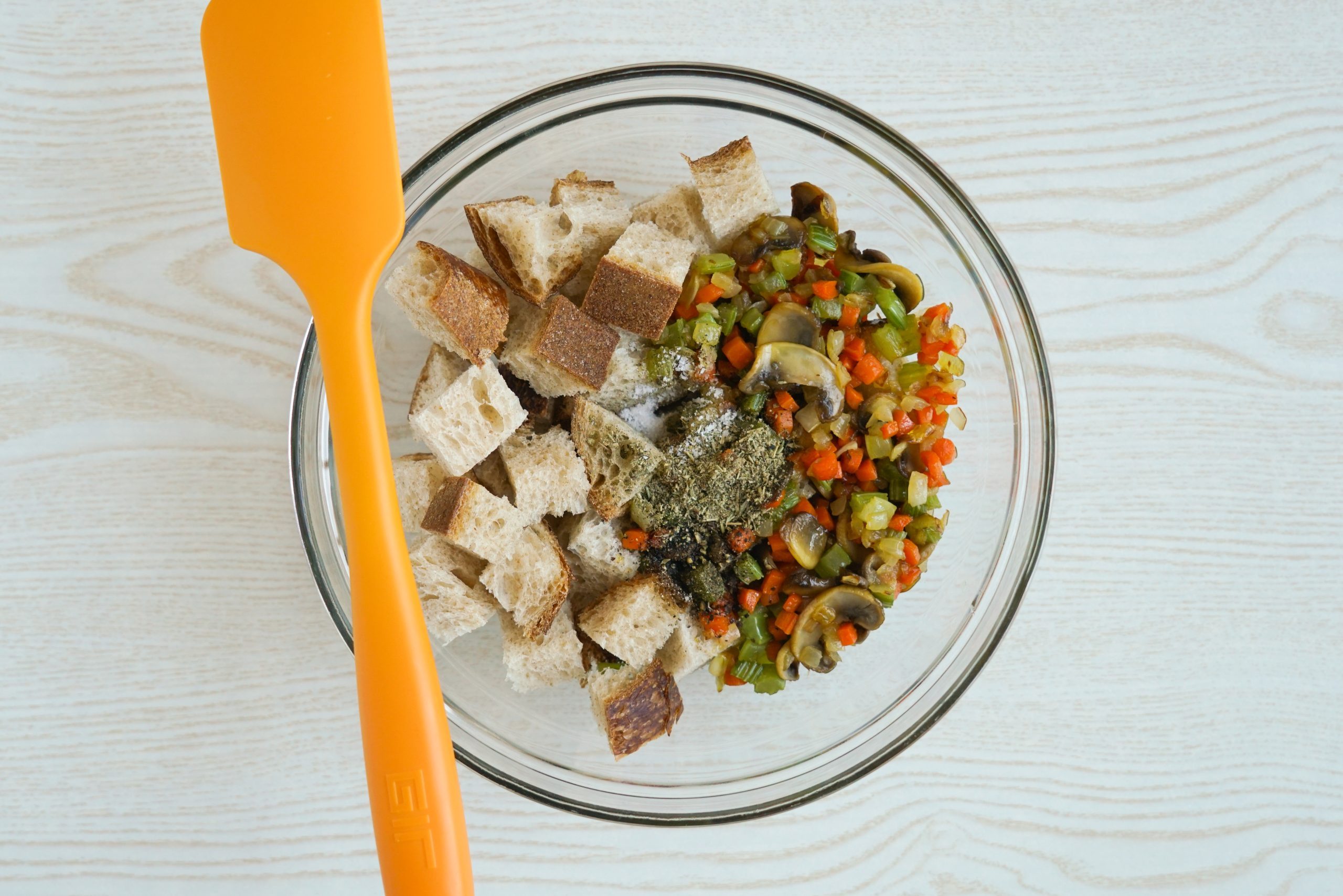 Mixing together sourdough stuffing