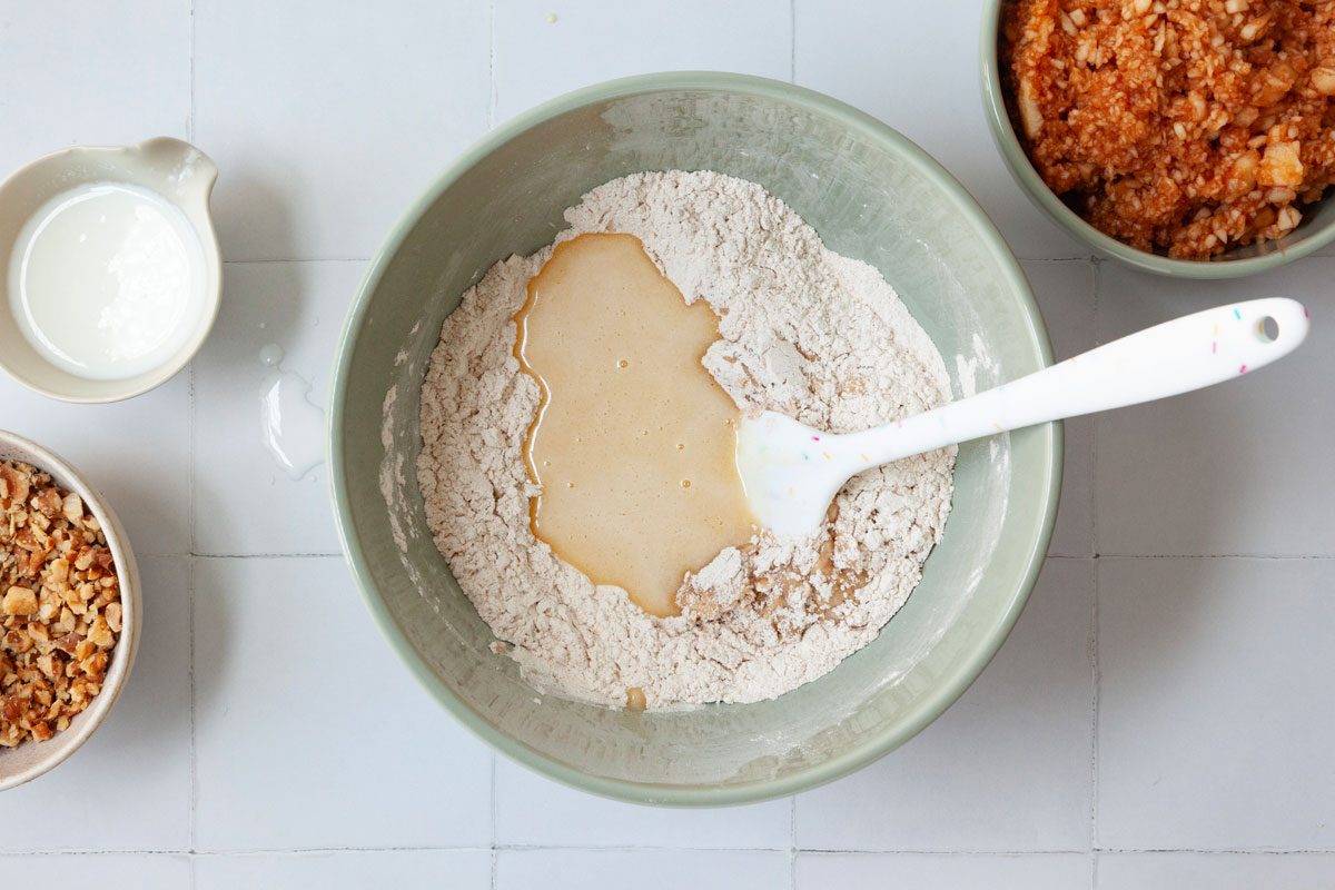 Step 4 of Taste of Home Apple Spice Cake is to combine the dry ingredients before adding the buttermilk and wet ingredients, then stirring in the apples and nuts