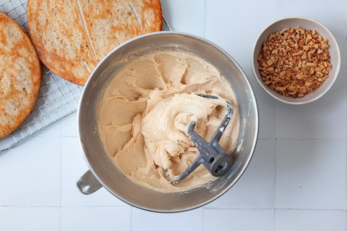 Step 6 of Taste of Home Apple Spice Cake is to combine the frosting ingredients