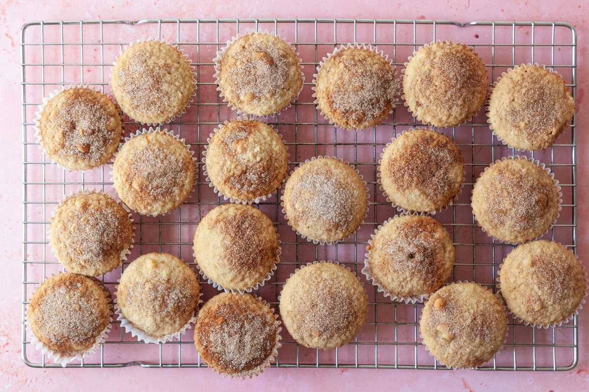 Step 2 of Taste of Home Applesauce Muffins is to fill greased or paper-lined muffin cups three-quarters full. Bake until a toothpick inserted in the center of a muffin comes out clean, 20 to 25 minutes. Let the muffins cool in the pan for five minutes before removing them to wire racks. Sprinkle the tops with cinnamon sugar, if desired.