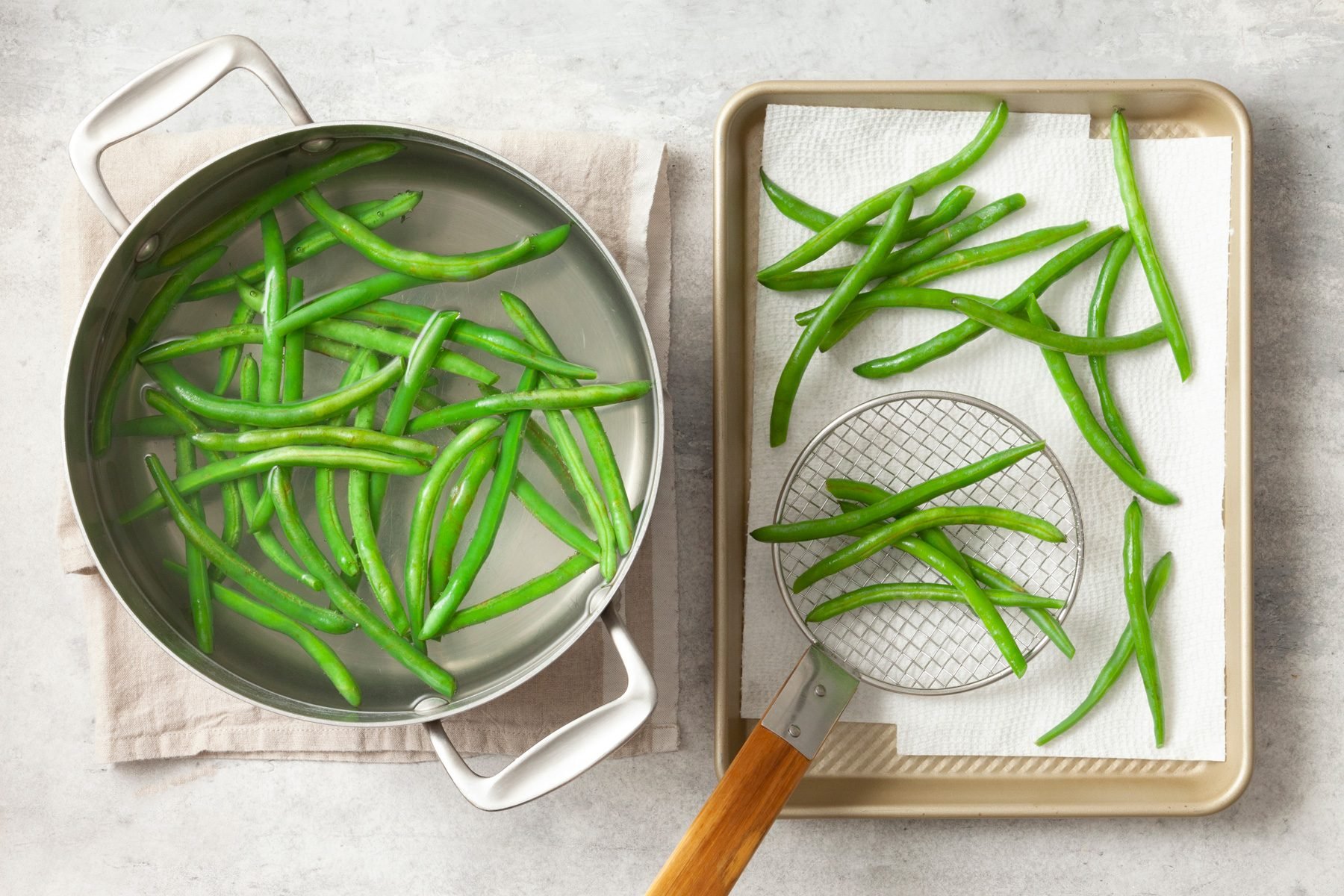 Top shot of beans in a large saucepan with water